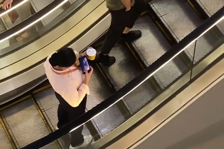 The Distracted Person Doesn't Realise Escalator Has Stopped